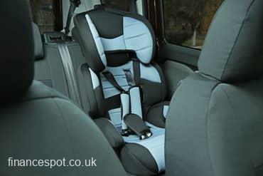photo of empty safety seat for baby in car